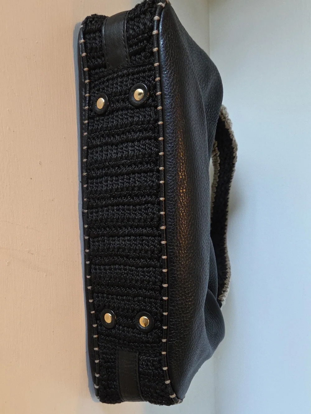 The Sak Pink Label knitted handle black leather handbag.